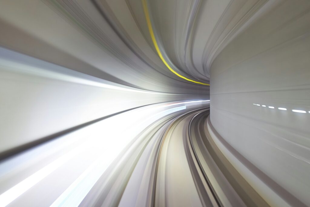 Light trails streaking through a tunnel