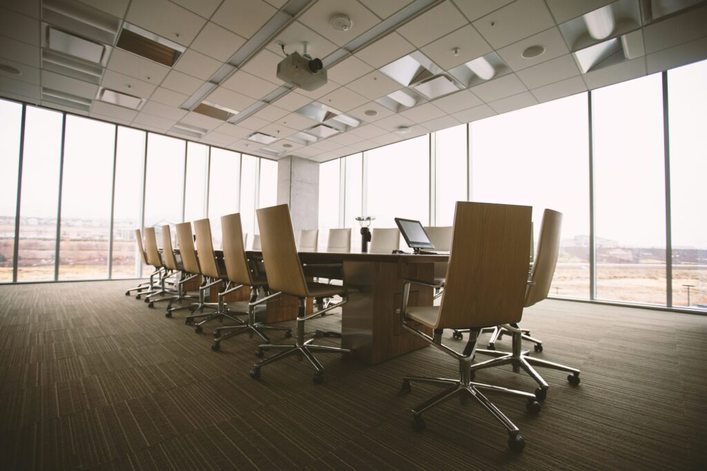 Wooden conference table and chairs